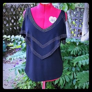 Dressy knit top with stud details